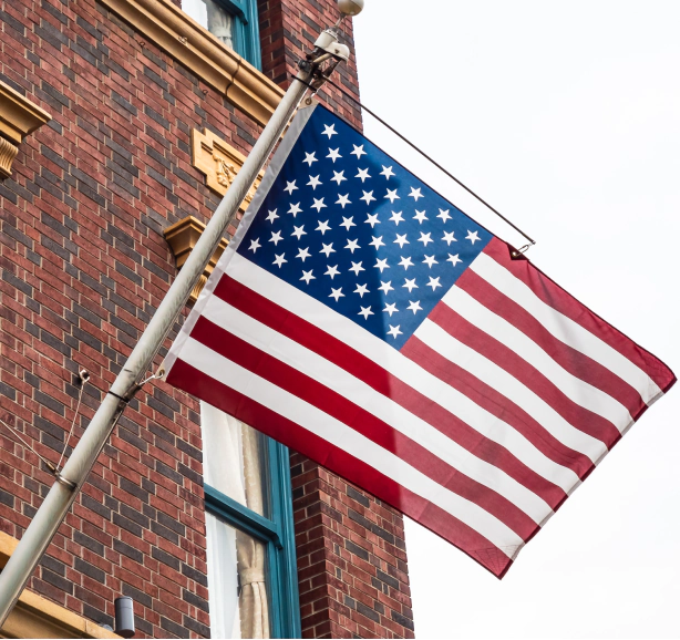american flag on a building